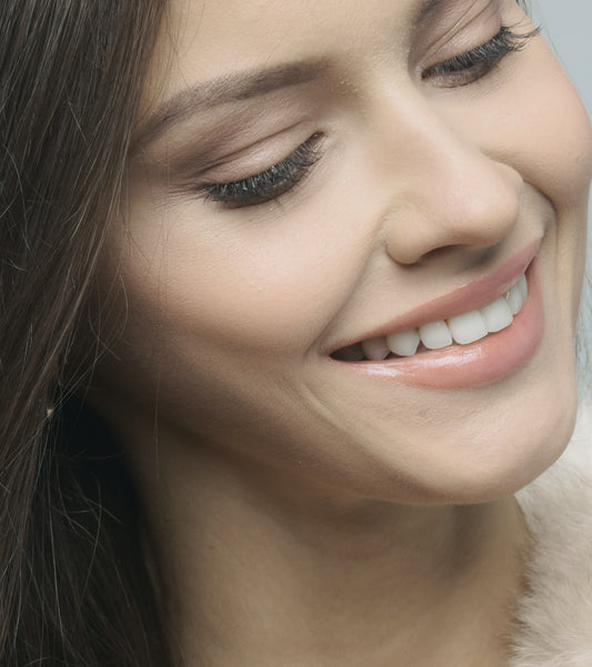 Women smiles beautifully after EMAX veneers. Emax porcelain veneers packages  in Vietnam are much more affordable than in Melbourne, Sydney, Perth, or Brisbane, Australia. Emax veneers are more premium than traditional veneer. They look translucent and mimic the colour of natural teeth. Glamjet offers 6 veneer, 10 veneer, 16 veneer packages in Vietnam, Thailand, and South Korea with payment plans