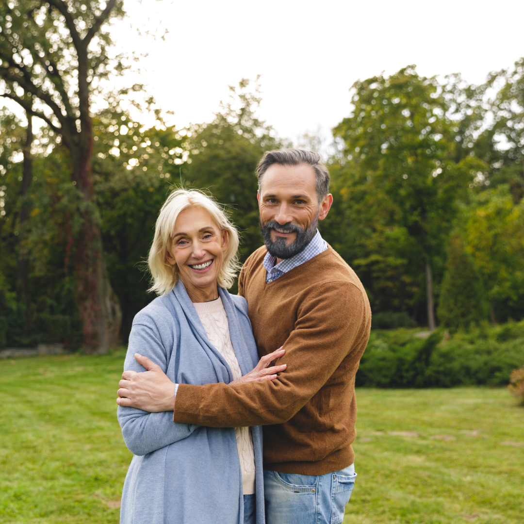 Middle aged couple smiling happily after full mouth restoration with all-on-4 dental implants  in Vietnam with Glamjet. Glamjet works with the best dentists in Hanoi and Ho Chi Minh city in Vietnam