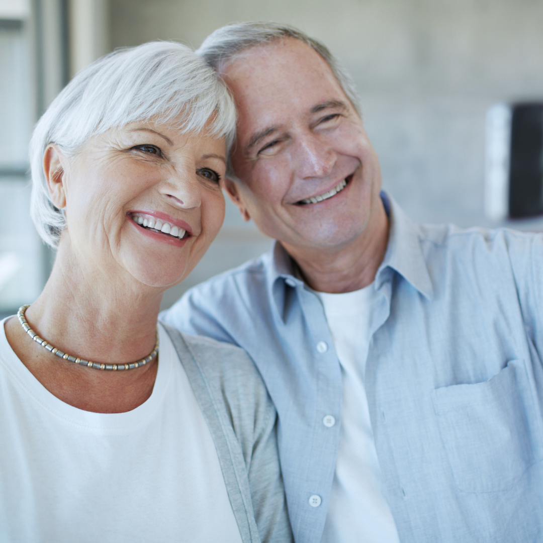 Middle aged couple smiling happily after full mouth restoration with all-on-4 dental implants  in Vietnam with Glamjet. Glamjet works with the best dentists in Hanoi and Ho Chi Minh city in Vietnam